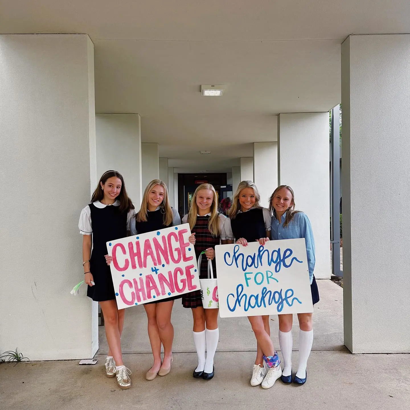 girls collecting change 