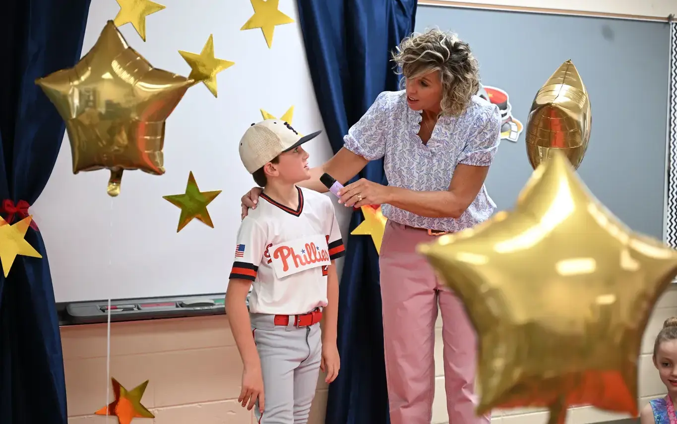 lower school boy and teacher 