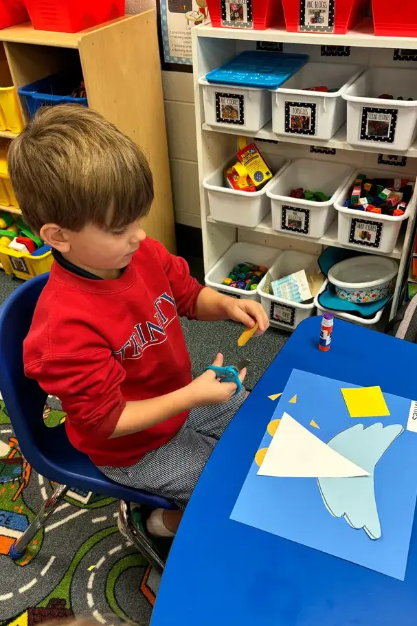 preschool boy doing craftson page image