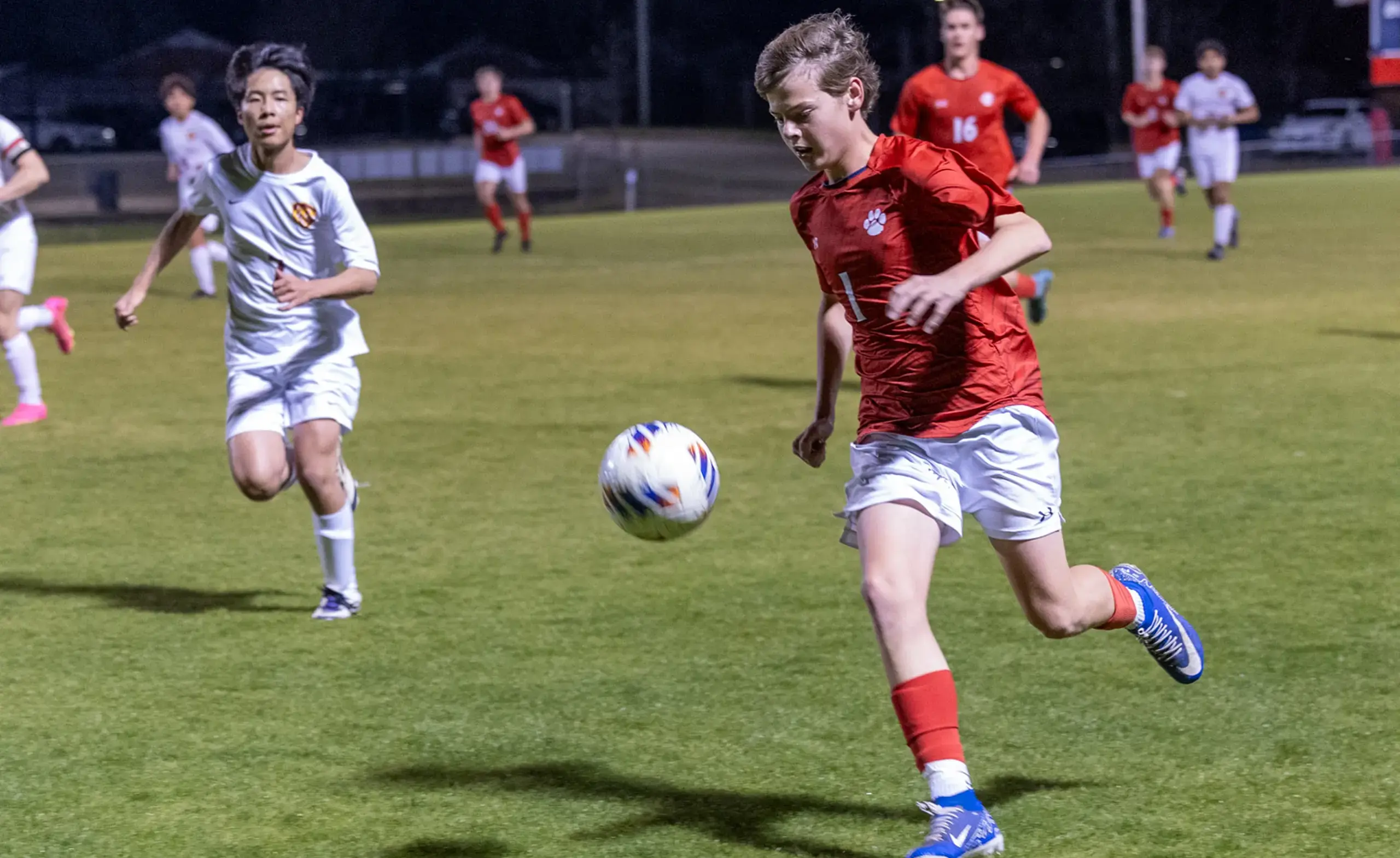 Student athlete playing soccer