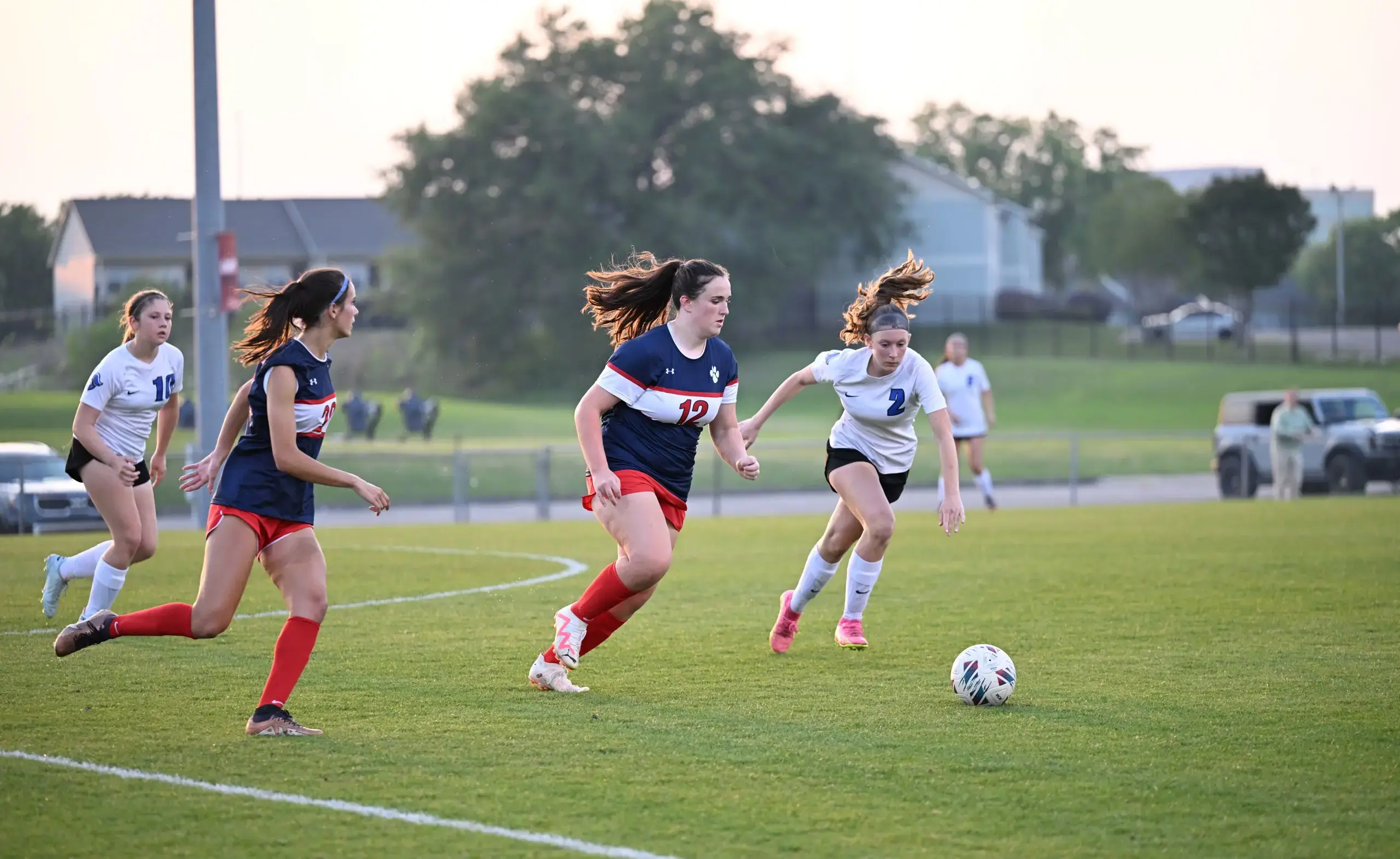 Athlete kicking a soccer ball