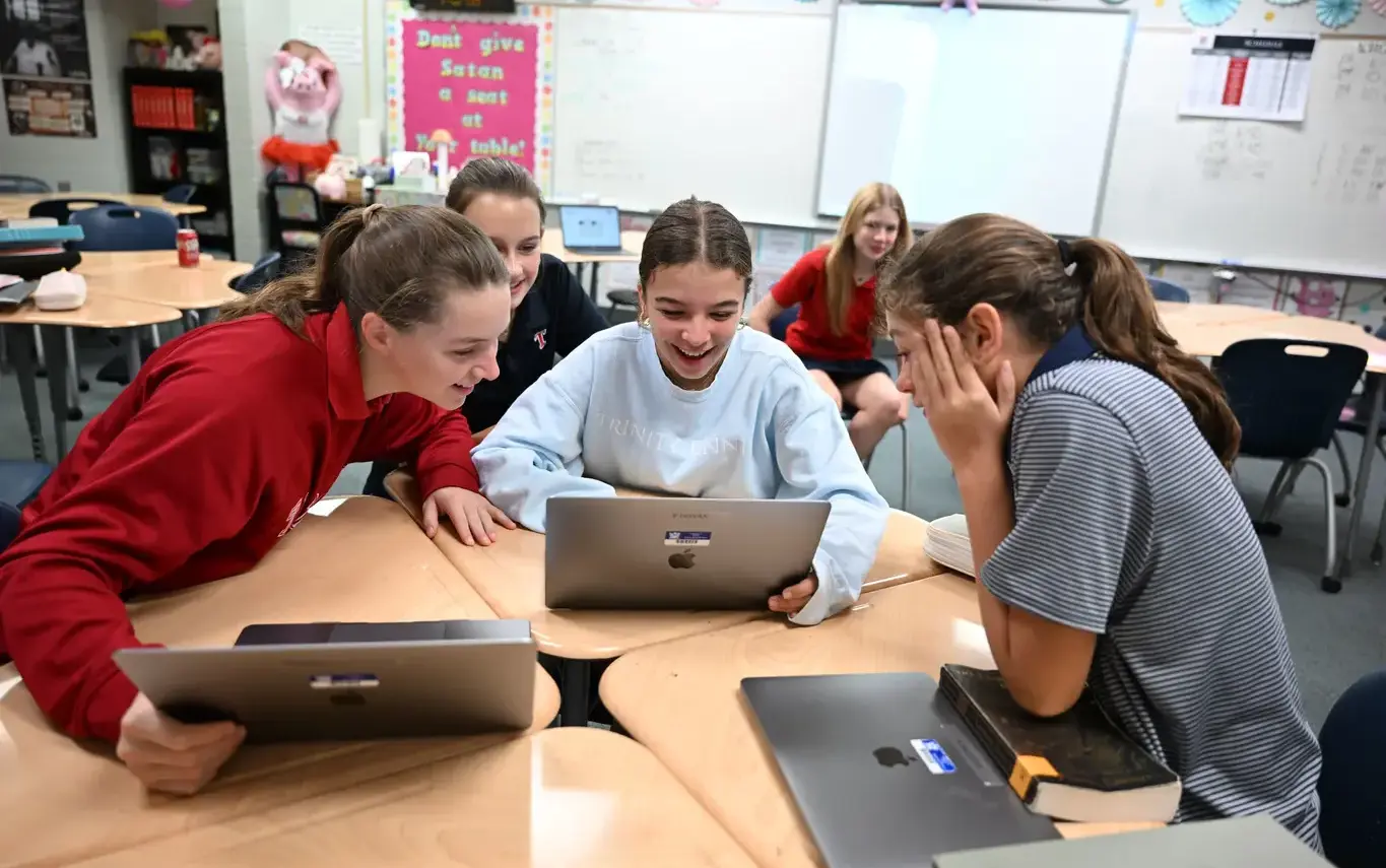 girls with laptops at technology classon page image